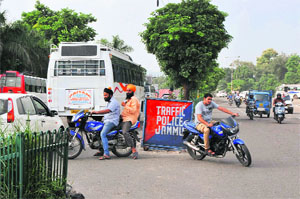Haphazard movement of traffic has made the Police Lines crossing dangerous for commuters in Jammu. 