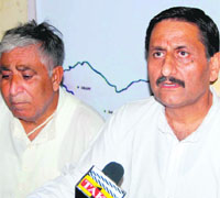 Panun Kashmir president Ashwani Kumar Chrangoo addresses mediapersons in Jammu on Friday. 