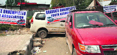 Taxis parked on a piece of land belonging to the Srinagar Development Authority. 