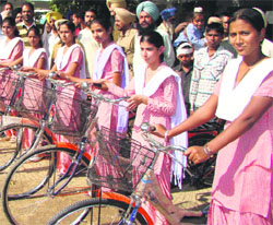 A file photo of girls with free bicycles at a government school in Patiala.