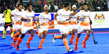 The Indian team celebrates victory over Malaysia that, besides putting them in the final of the Asia Cup, has also secured a World Cup berth for them. 