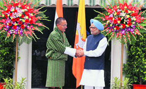 Prime Minister Manmohan Singh with his Bhutanese counterpart Lyonchhen Tshering Tobgay in New Delhi on Saturday. 
