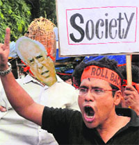 A protester raises slogans against the Marriage Law proposed by the Union Government in Kolkata on Saturday. 