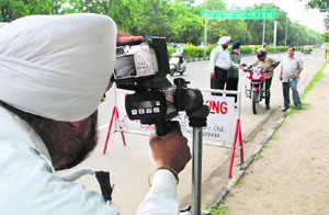 The Chandigarh Police detects overspeeding vehicles with the help of cameras and issue challan to the drivers on the dividing road of Sectors 10-16, Chandigarh