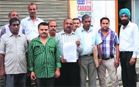 The shopkeepers, who were evicted by the PRTC.