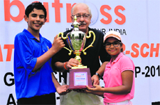 Aadil Bedi and Vasundhara Thiara receive the winning trophy of the 3rd Albatross Inter-School Golf Championshp at the ITC Classics Golf Club, Gurgaon. 