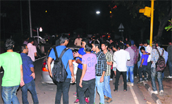 Students return from a trip sponsored by a student organisation on Sunday.