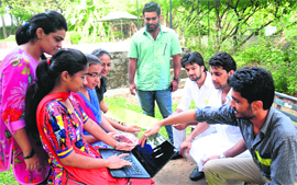 Leaders of the Students Organisation of Panjab University prepare the strategy for the final two days before the elections; and (below) a posse of police keep a check during the canvassing at Panjab University on Sunday evening .
