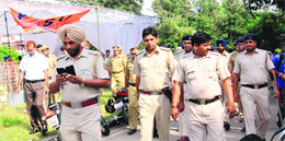 A posse of police keep a check during the canvassing at Panjab University on Sunday evening 