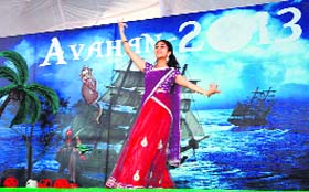A student gives a performance during the freshers party at the Dehradun Institute of Technology University on Sunday