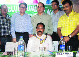 Bhupinder Mahajan, president, Rotary Club, being honoured with a collar band at a function in Sundernagar on Sunday