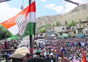 Congress supporters attend a party rally in Kargil on Sunday
