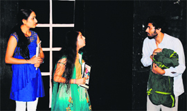 A scene from the play being staged at Natrang Studio Theatre in Jammu on Sunday.