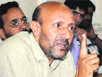 Langate MLA Engineer Rasheed addresses a press conference in Srinagar on Sunday.