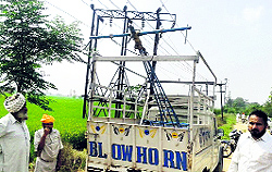 The vehicle touching high-tension wires that electrocuted two persons at Kot village in Samrala on Sunday