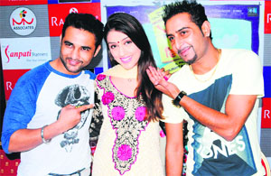 Star cast of Punjabi movie "Viyah 70 km" during a promotional tour of their film in Amritsar on Monday.