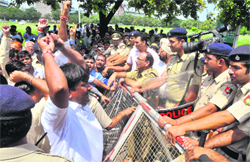 Supporters of Asaram Bapu block the road of Sectors 33 and 34 in Chandigarh on Monday.