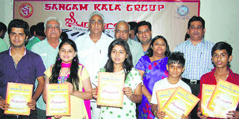 Winners of the Sangam Kala National Singing Talent Hunt with senior management of the GIMT.