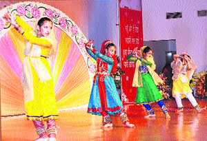 Schoolchildren perform during a function in Gurgaon. 