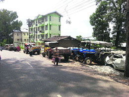 The seized tractor-trailers parked outside the police station in Palampur on Monday.