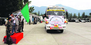 Students being welcomed at Larkipora on Monday. 