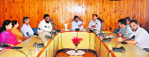 Muhammad Afzal Zargar being accorded a farewell at the University of Kashmir on Monday. 