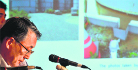 Nuclear Regulation Authority chairman Shunichi Tanaka (L) speaks in Tokyo on Monday.