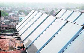 A hotel uses large solar energy equipment  to save energy in Amritsar