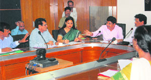 Officials deliberate on the issue after Panchkula Deputy Commissioner SS Phulia (extreme right) asks Roadways traffic manager SS Verma (not in picture) to leave a meeting in Panchkula on Tuesday. 