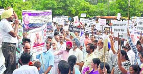 Protesting against the murder of anti-superstition activist Dr Narendra Dabholkar, who was shot dead in Pune, members of the Tarksheel Society hold a demonstration in Jalandhar on Tuesday