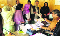CMs political secretary Tanvir Sadiq meets members of various delegations in Srinagar on Tuesday.