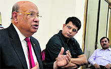 Lord Raj Loomba of the Loomba Foundation, along with Deputy Commissioner Rahul Tiwari, gives details about a programme for widows in Ludhiana on Tuesday