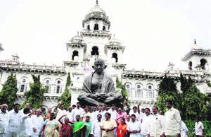 Congress ministers and legislators from Seemandhra protest against the bifurcation of Andhra Pradesh, at the state Assembly in Hyderabad on Tuesday.