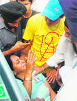 Nirmal Kaur broke her leg after a bus blowing pressure horn came dangerously close to her vehicle near the bus stand. 