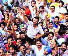 Chandan Rana of the NSUI celebrates his victory on the campus