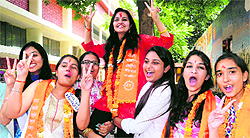 Gurjit Singh, who was elected the president of the student council, breaks into a frenzy at Government College, Sector 11; Shivangi Sharma, president, in a jubilant mood at MCMDAV College in Sector 36 on Wednesday