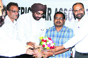 Members of District Bar Association honour Divisional Commissioner R Venkatratnam in Jalandhar on Wednesday. 