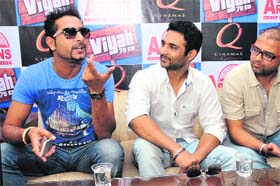 Singer-turned-actor Geeta Zaildar (left) along with actor Harish Verma speaks about their upcoming film Viyah 70 km in Bathinda on Thursday