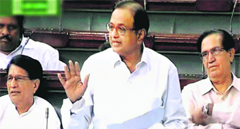 Finance Minister P Chidambaram speaks in the Lok Sabha in New Delhi on Thursday.  PTI