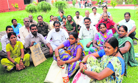 Benificiaries of the Small Flat Scheme 2006 wait for the verfication of their credentials at the Chandigarh Housing Board office.