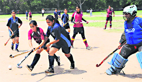 Players in action during a hockey match at Government Model Senior Secondary School, Sector 37, in Chandigarh on Thursday.