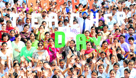 Teachers and students celebrate the Teachers Day in Patiala on Thursday.