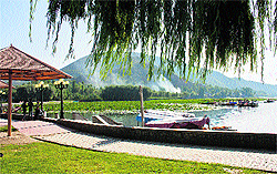 Visitors at the garden adjacent to the Manasbal Lake in Ganderbal district, 20 km north of Srinagar