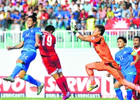 Players vie for the ball on Thursday