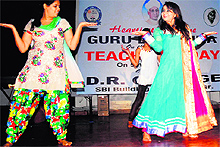 Students of DR College perform at a celebration during a Teacher's Day function in Amritsar on Friday