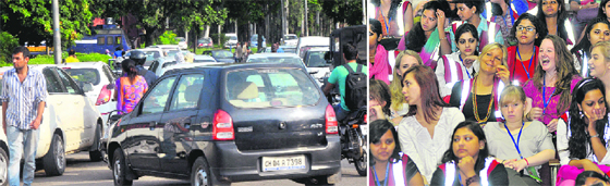 Traffic chaos on one of the roads on the PU campus; and (right) students from the UK and Delhi University during a visit to Panjab University in Chandigarh on Friday.