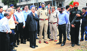 UT Administrator Shivraj V Patil has a word with UT SSP Naunihal Singh during a visit to oversee arrangements at Dhanas village in Chandigarh on Friday.