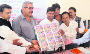 MC president Manmohan Singh Mall releases a Garhwali music album in Mussoorie on Friday. 