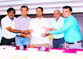 Members of the Laghu Udyog Bharti hand over a memorandum to Industry Minister Anil Joshi (centre) in Amritsar