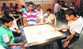 A carrom match in progress at St Stephens School, Sector 45, in Chandigarh on Saturday.